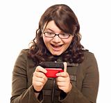 Excited Young Caucasian Woman Texting on Her Mobile Phone Isolated on White.
