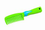 green plastic hairbrush