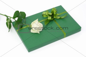 Green gift with white rose