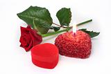 Rose, gift and candle