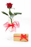Rose in vase and gift