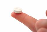Pill on finger