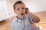 Child talking with telephone