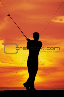 Playing golf at dawn