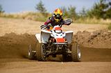 Young man on a white quadbike