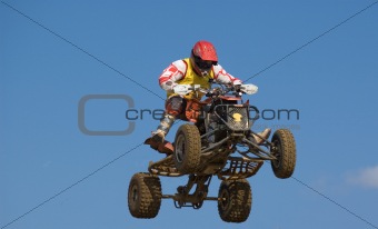 Man Flying on a quadbike really high
