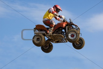 Man Flying on a quadbike really high