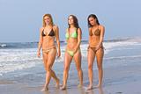 Beautiful girls on the beach all in bikinis