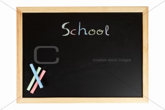 Chalkboard with colored chalks