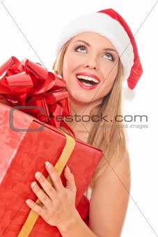 Cheerful santa helper girl with gift box 
