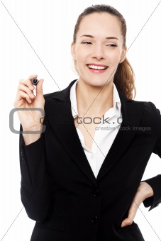 Young businesswoman holding a marking pen on white background studio