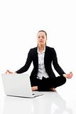 young businesswoman with laptop on the floor on white background studio