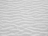 Abstract background of sand ripples at the beach