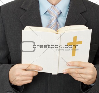 Man reads Catholic Bible