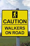 caution walkers on road sign with clipping path