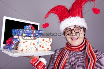 Funny men in christmas cap with gift boxes and notebook. 