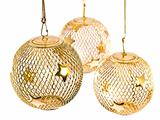 Golden Christmas ornaments isolated on a blank background