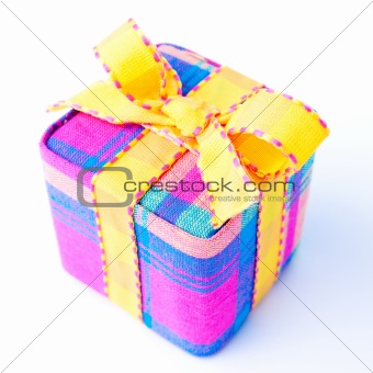 Colorful striped gift box isolated.