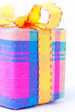Colorful striped gift box isolated.