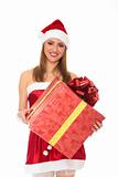 Cheerful santa helper girl with big gift box.