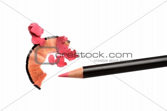 Pencil cosmetic sharpening with husk on white