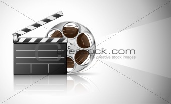 cinema clapper and video film tape on disc