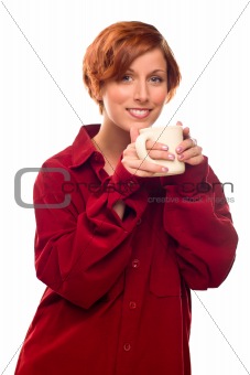 Pretty Red Haired Girl with Hot Drink Mug Isolated on a White Background.
