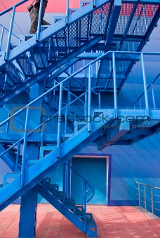 A man running up the stairs
