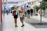 two blond shopping woman