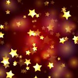 golden stars in red and violet lights