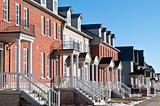 Row of Recently Built Townhouses on a Suburban Street