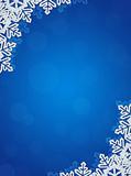 Blue Background with Snowflakes in Border. Space for Text