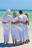 Two Couples Generations of Family Embracing on Tropical Beach 