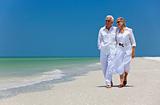 Happy Senior Couple Dancing Walking on A Tropical Beach