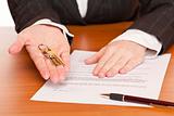 Business woman holds key and contract in hands