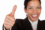 Smiling self confident business woman shows thumb up