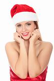 Beautiful young woman in red wearing santa hat.