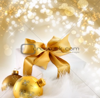 Gold ribbon gift with holiday background