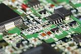 Surface of electronic circuit board - soldered components