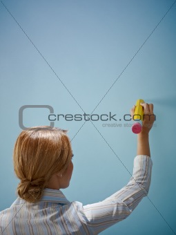 businesswoman writing with big pencil