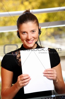 Young woman with a sheet of paper