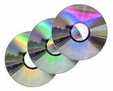Three colored CD / DVD disks isolated on White