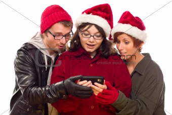 Three Friends Enjoying A Cell Phone Together Isolated on a White Background.