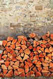 firewood wood pile stacked triangle shape