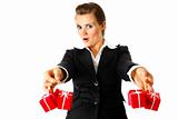 Excited modern business woman holding presents in hands 
