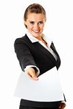 Smiling  modern business woman giving empty white paper
