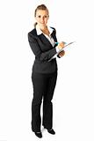 Full length portrait of smiling modern business woman with clipboard and pen
