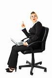 Sitting on chair with  laptop  surprised modern business woman got  idea
