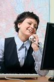 Pretty businesswoman laughs with telephone