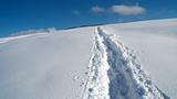 Path in snow leading to the top